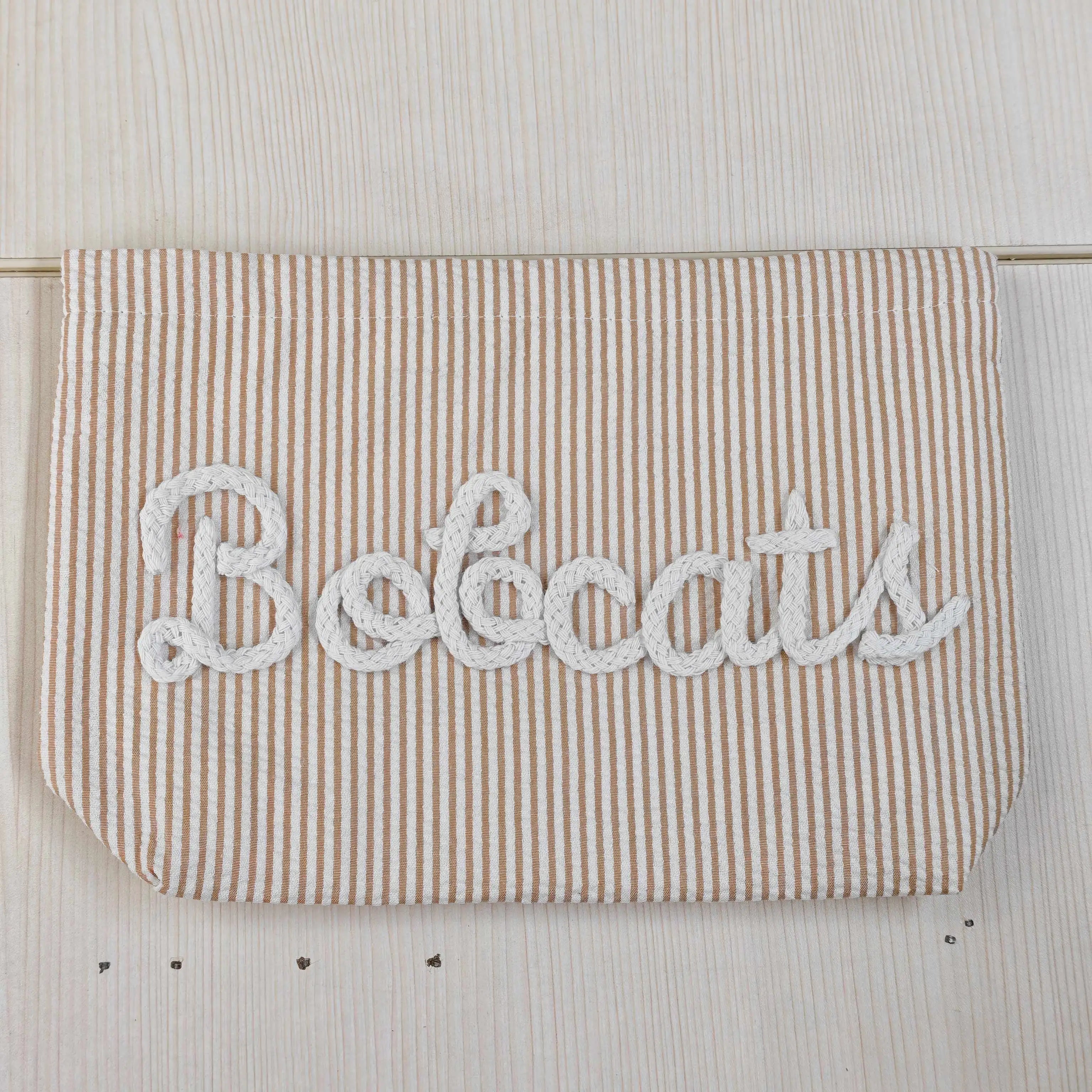 Brodé : trousse de maquillage personnalisé ou non