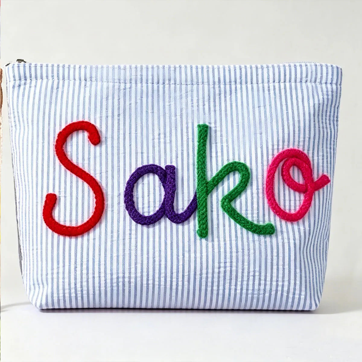 Brodé : trousse de maquillage personnalisé ou non